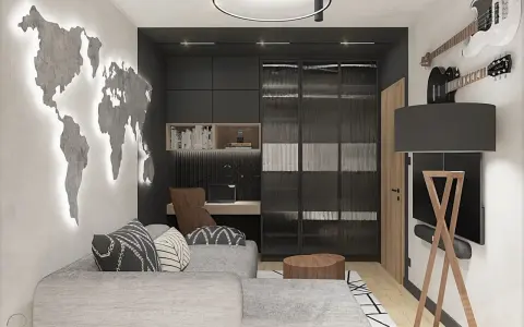 Męski pokój inspiracje: mapa świata na ścianie, gitary, wygodna sofa i biurko. Idealne miejsce dla podróżnika i muzyka.